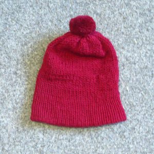 Čepice červená dvojitá pletená na mlýnku na pletení vyrobeny v Dílně Jinan.